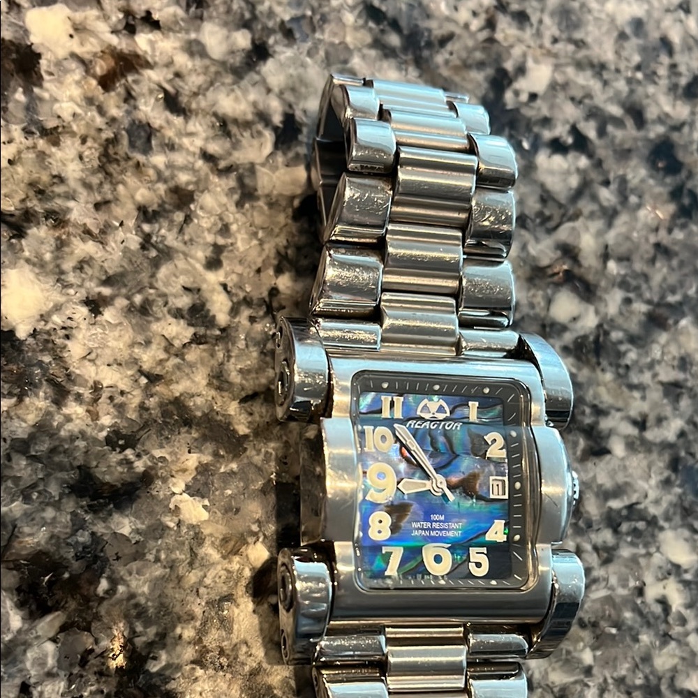 REACTOR Ladies luxury watch. Limited edition with custom waved crystal.